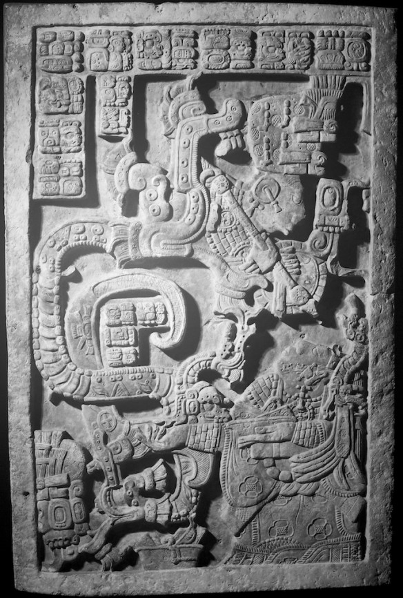 Figure 4. A Maya noblewoman conjures a supernatural being through a sacrificial burnt offering of her own blood. Lintel 25 from Yaxchilán (Photograph by William Hamblin).